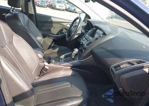 2012 Ford Focus Titanium z USA, uszkodzony, nr VIN 1FAHP3N23CL151465